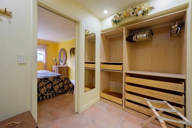a view of a bedroom with closet
