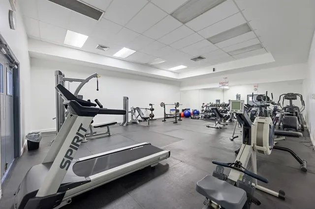 a view of a room with gym equipment