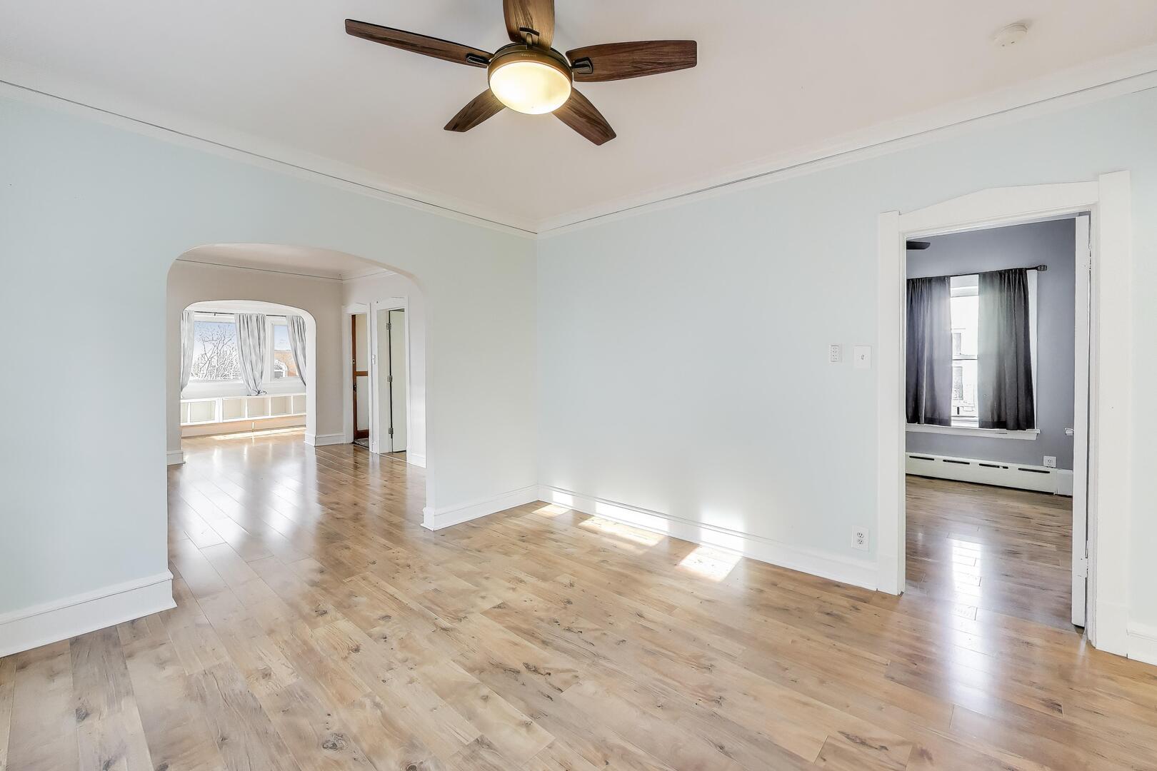 620 Elgin Avenue, Unit 2 Forest Park, IL 60130 - Photo 12 of 25 wooden floor in an empty room with a window
