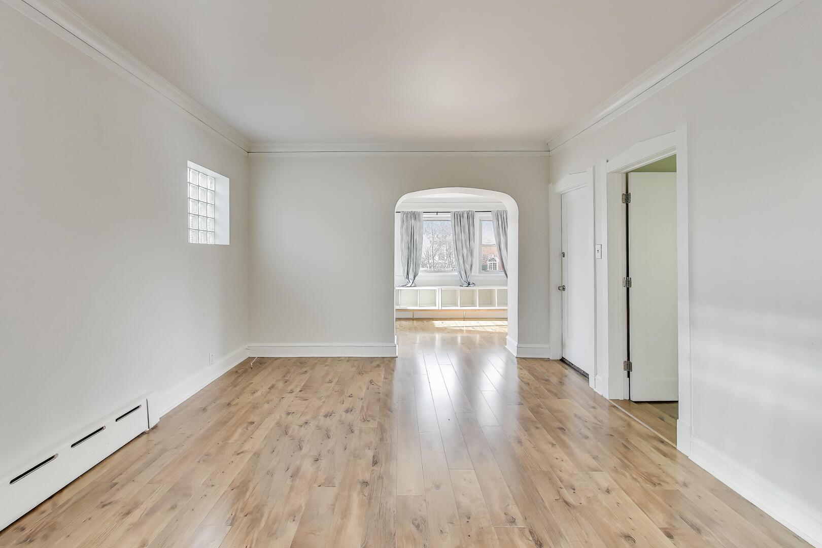 620 Elgin Avenue, Unit 2 Forest Park, IL 60130 - Photo 18 of 25 wooden floor in an empty room with a window