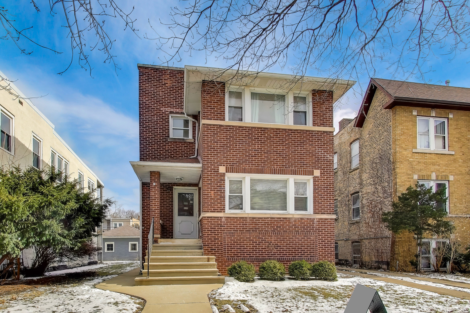 620 Elgin Avenue, Unit 2 Forest Park, IL 60130 - Photo 2 of 25 a front view of a house with a yard