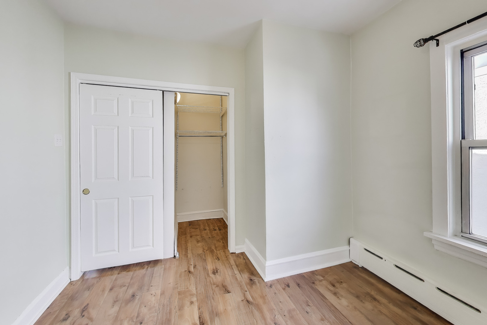 620 Elgin Avenue, Unit 2 Forest Park, IL 60130 - Photo 7 of 25 a view of wooden floor in an empty room