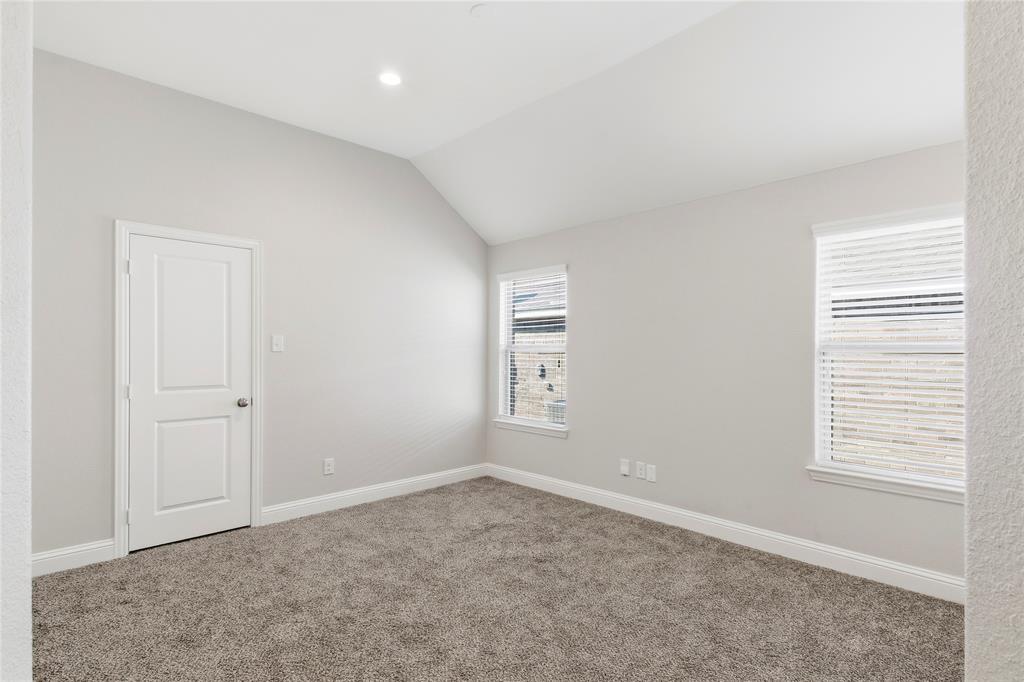 413 Allbright Road Celina, TX 75009 - Photo 17 of 37 an empty room with windows