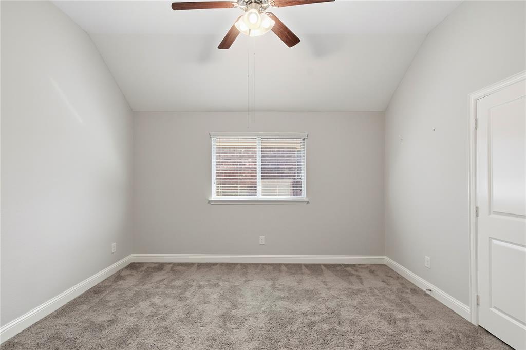 413 Allbright Road Celina, TX 75009 - Photo 24 of 37 an empty room with a window and a fan
