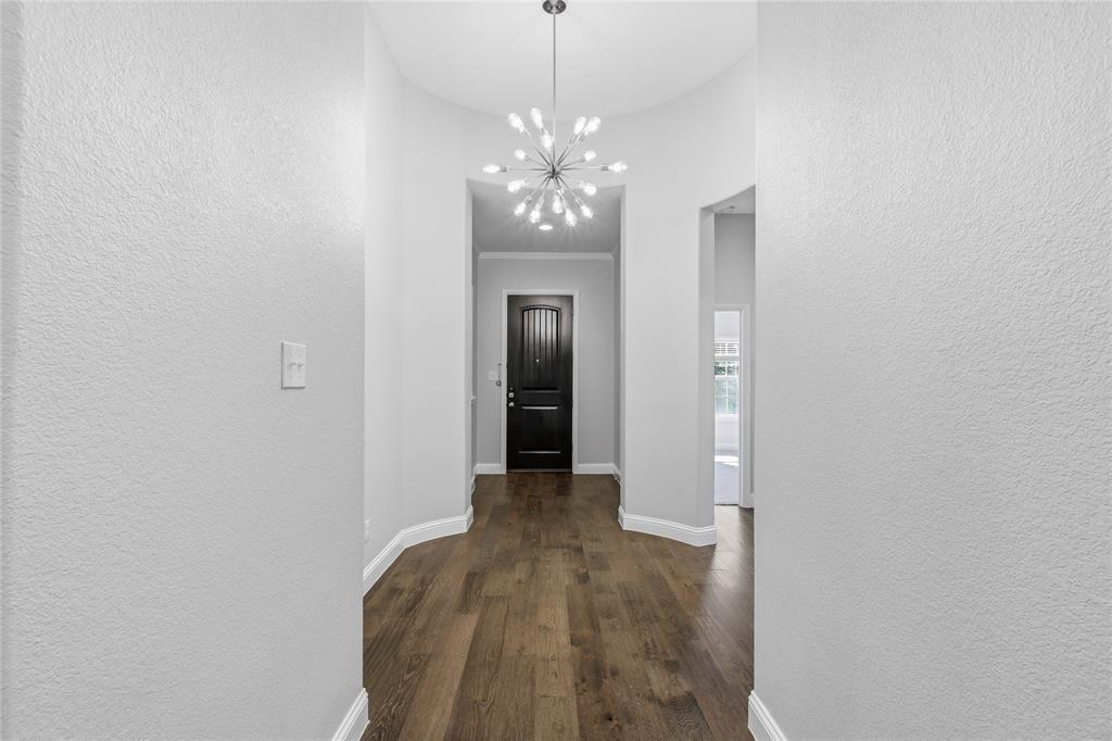 413 Allbright Road Celina, TX 75009 - Photo 25 of 37 a view of a chandelier in big room and chandelier