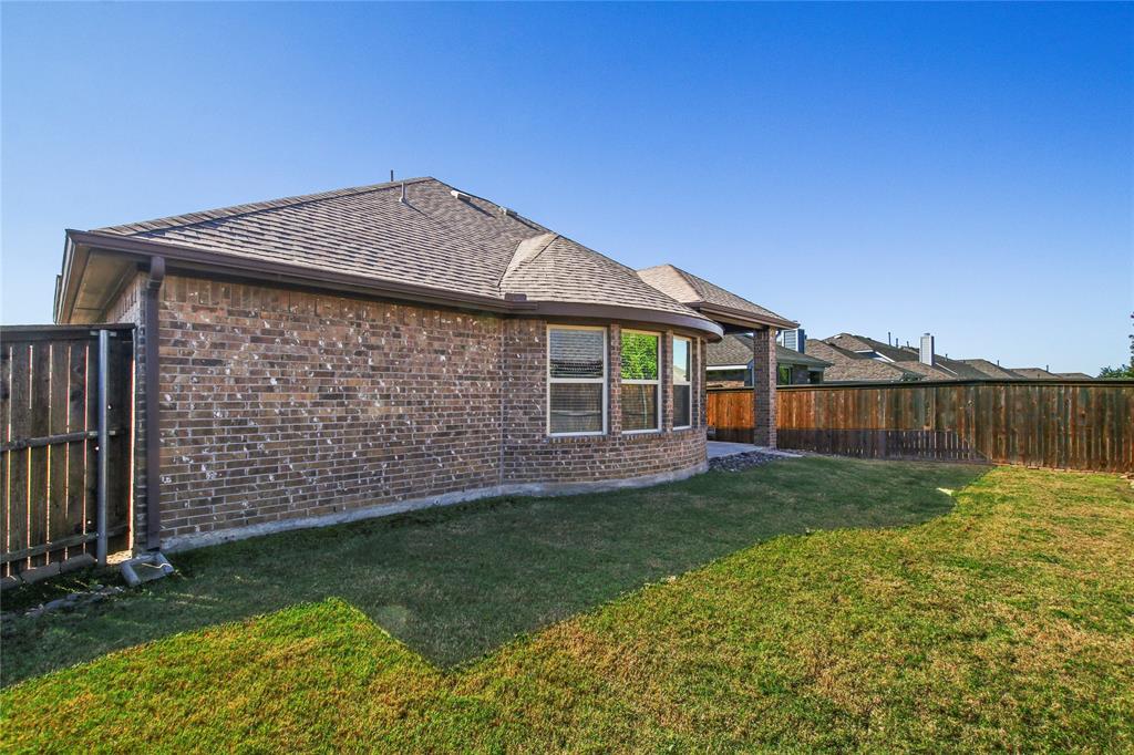 413 Allbright Road Celina, TX 75009 - Photo 30 of 37 a view of a house with backyard and garden