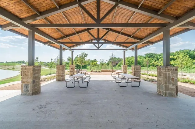 a view of an outdoor space and tennis court