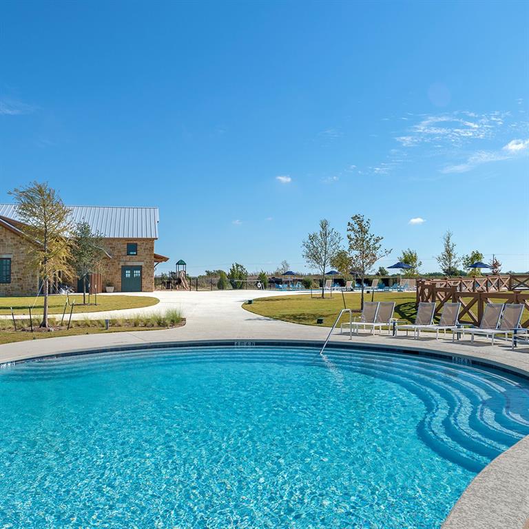 413 Allbright Road Celina, TX 75009 - Photo 34 of 37 a view of swimming pool with outdoor seating and yard