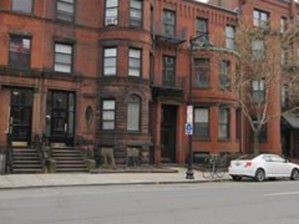 495-497 Beacon Street, Unit 10 Boston, MA 02215 - Photo 21 of 21 a car parked in front of a building