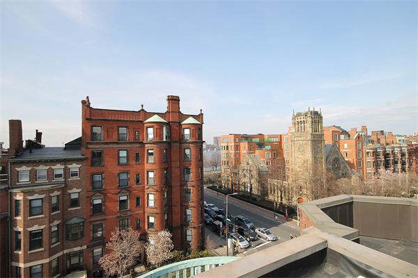 495-497 Beacon Street, Unit 10 Boston, MA 02215 - Photo 3 of 21 a view of city with tall buildings