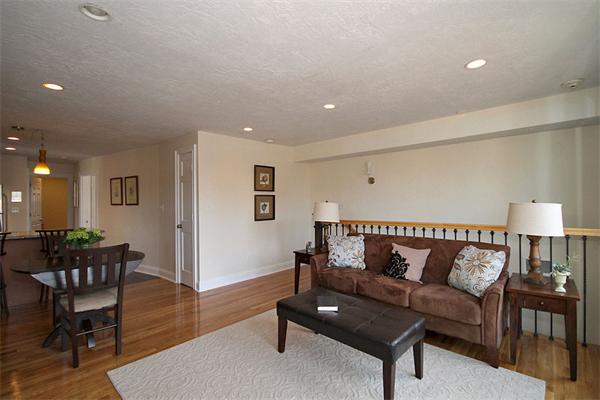 495-497 Beacon Street, Unit 10 Boston, MA 02215 - Photo 9 of 21 a living room with furniture rug and wooden floor