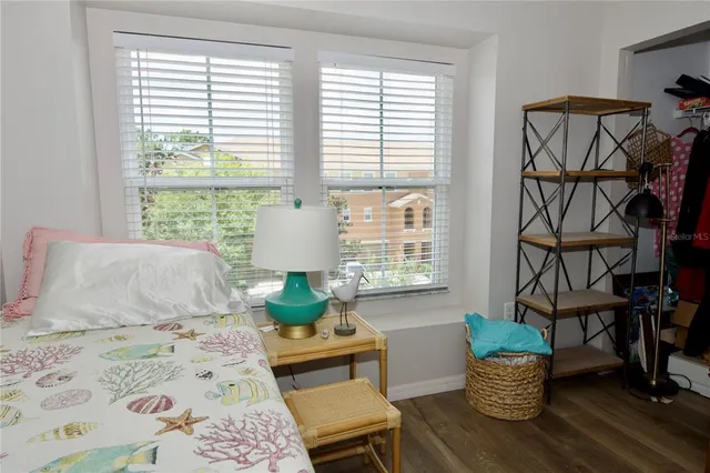 a room with furniture and flat screen tv