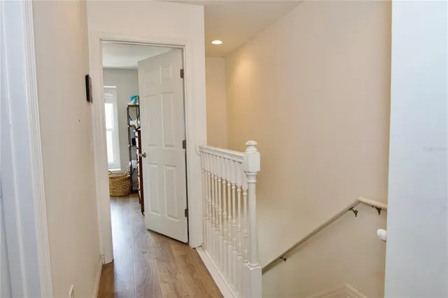 an aerial view of a house with a yard and a outdoor seating