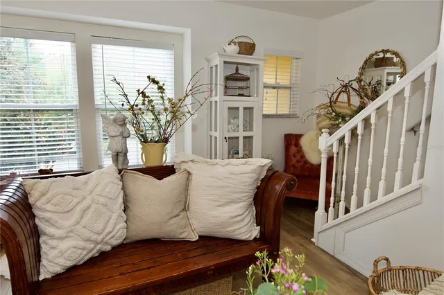 a view of balcony with furniture