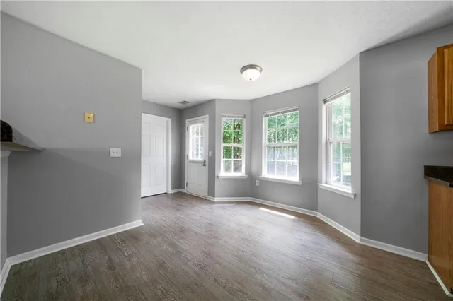 a view of livingroom with hardwood floor and window