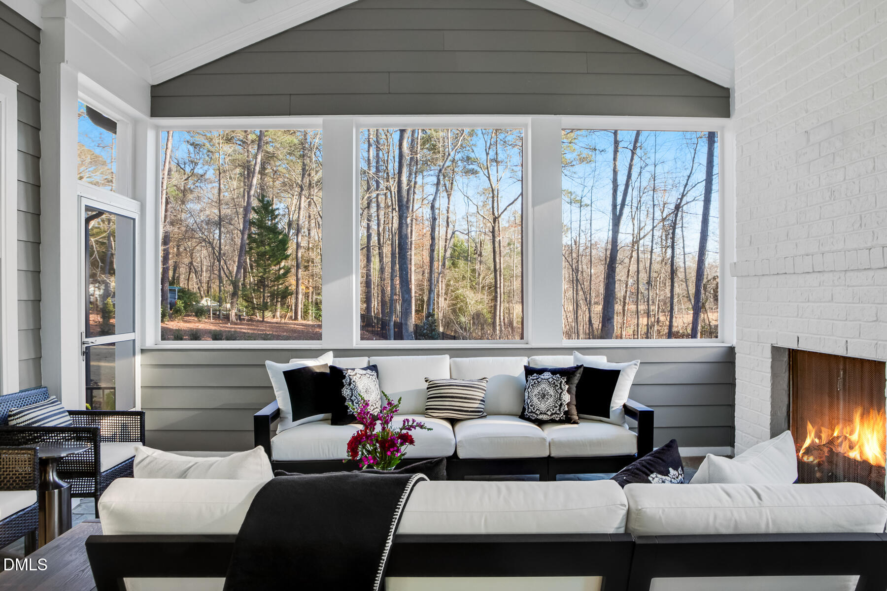2721 Sanctuary Woods Lane Raleigh, NC 27606 - Photo 42 of 50 a living room with furniture and a large window
