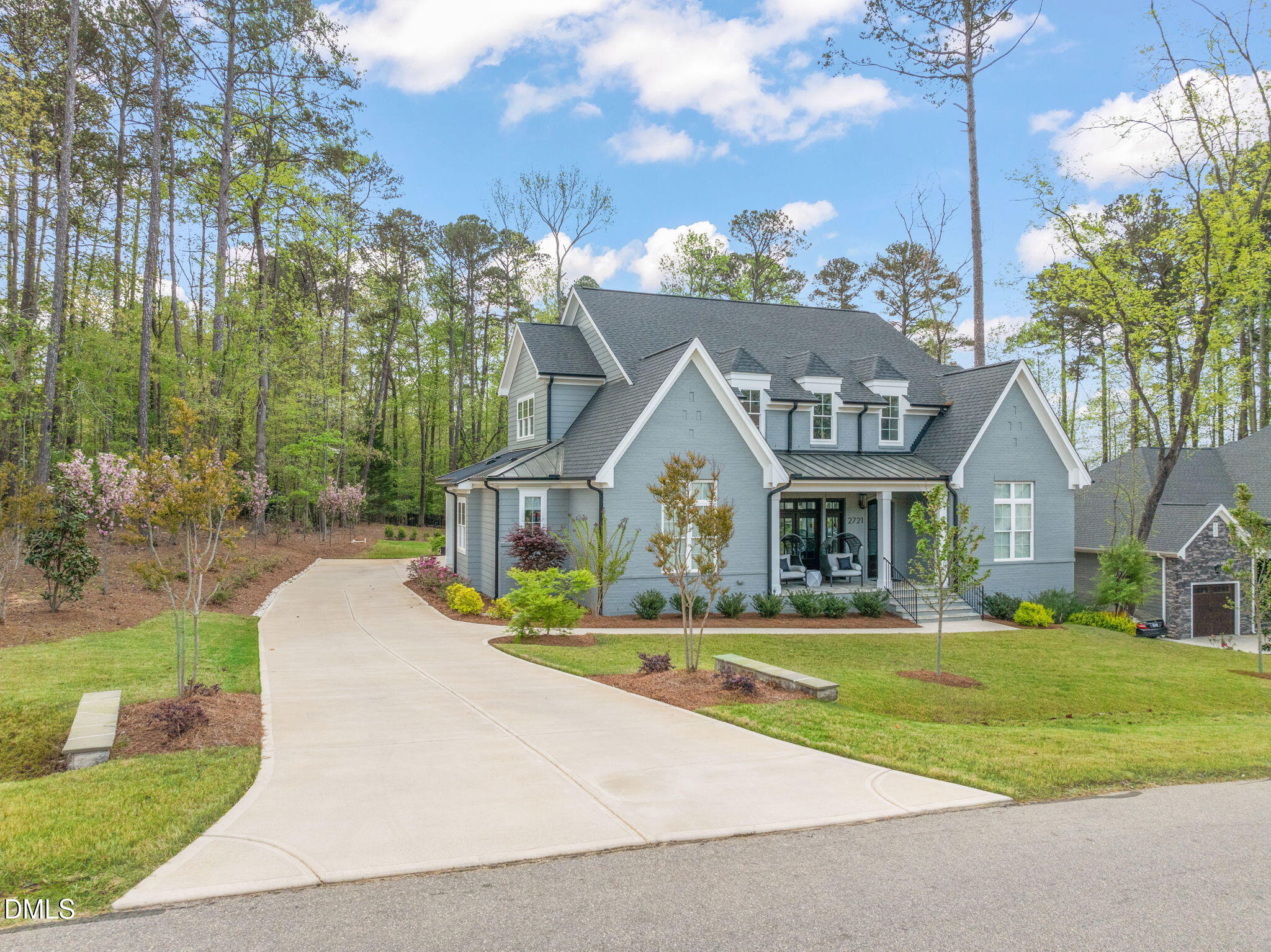 2721 Sanctuary Woods Lane Raleigh, NC 27606 - Photo 46 of 50 a front view of a house with a yard