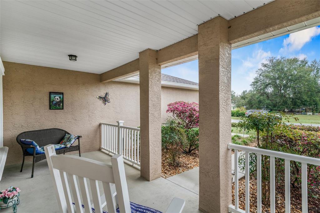 276 North Cunningham Avenue Inverness, FL 34453 - Photo 12 of 48 a view of a porch with furniture