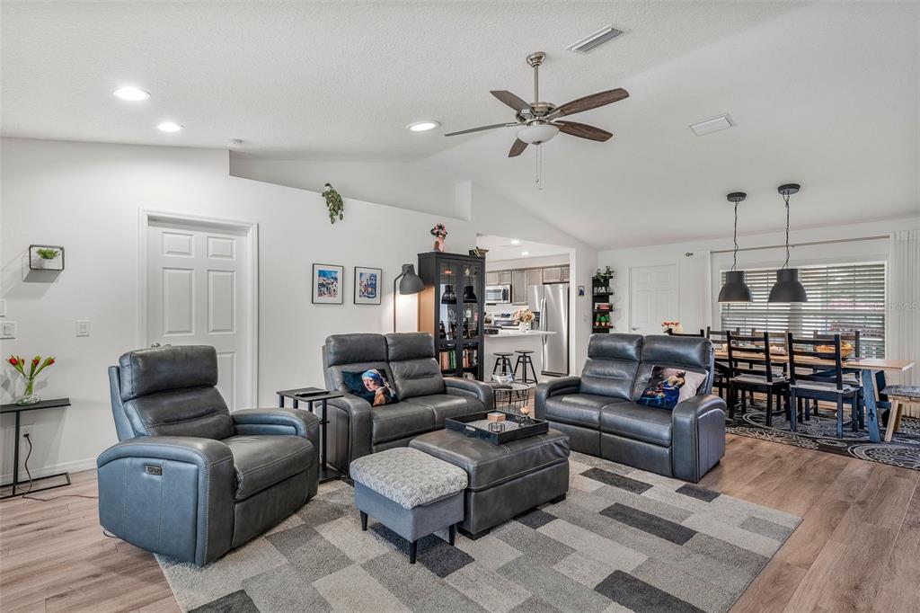 276 North Cunningham Avenue Inverness, FL 34453 - Photo 14 of 48 a living room with furniture kitchen view and a window