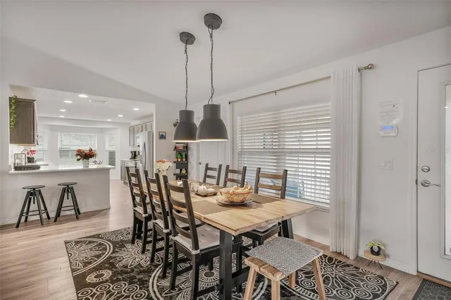 a view of a dining room with furniture