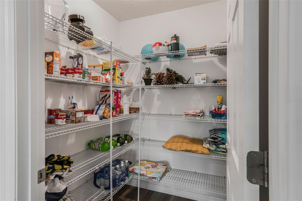 276 North Cunningham Avenue Inverness, FL 34453 - Photo 24 of 48 a view of open kitchen and shelves