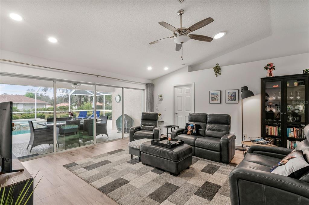 276 North Cunningham Avenue Inverness, FL 34453 - Photo 26 of 48 a living room with furniture ceiling fan and a large window
