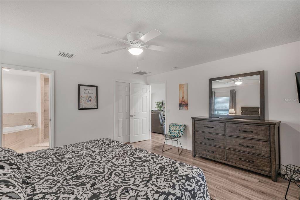 276 North Cunningham Avenue Inverness, FL 34453 - Photo 29 of 48 a bedroom with a bed and a dresser