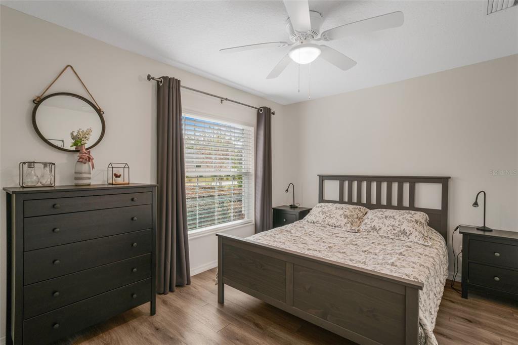 276 North Cunningham Avenue Inverness, FL 34453 - Photo 34 of 48 a bed room with a bed and a mirror