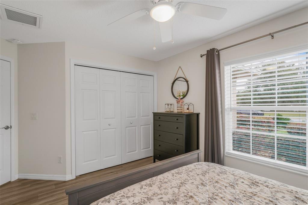 276 North Cunningham Avenue Inverness, FL 34453 - Photo 35 of 48 a view of a bedroom with cabinet and mirror