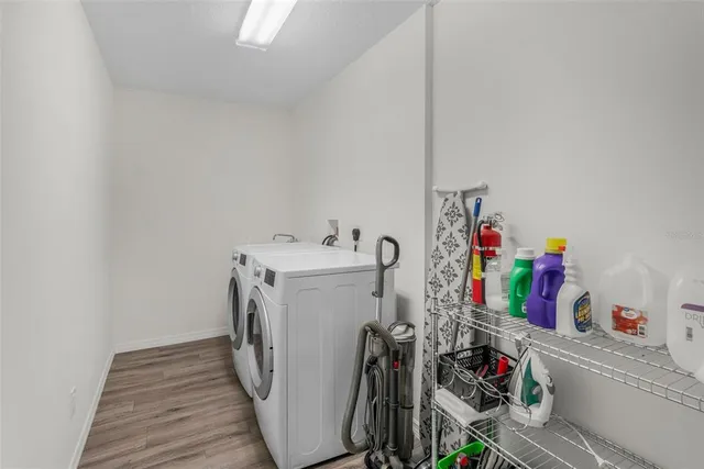 a utility room with dryer and washer