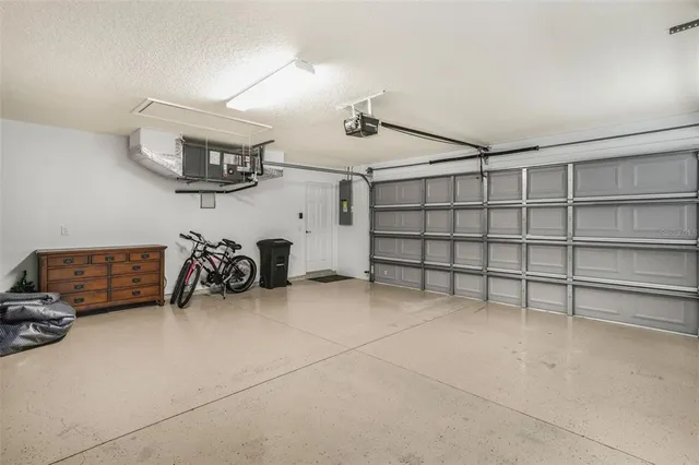 a view of a garage with furniture and a window