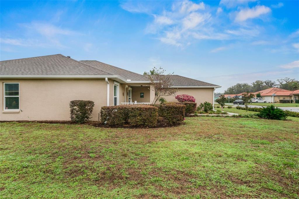 276 North Cunningham Avenue Inverness, FL 34453 - Photo 10 of 48 a front view of a house with garden