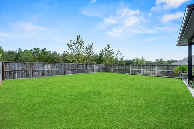 a view of a backyard with a garden