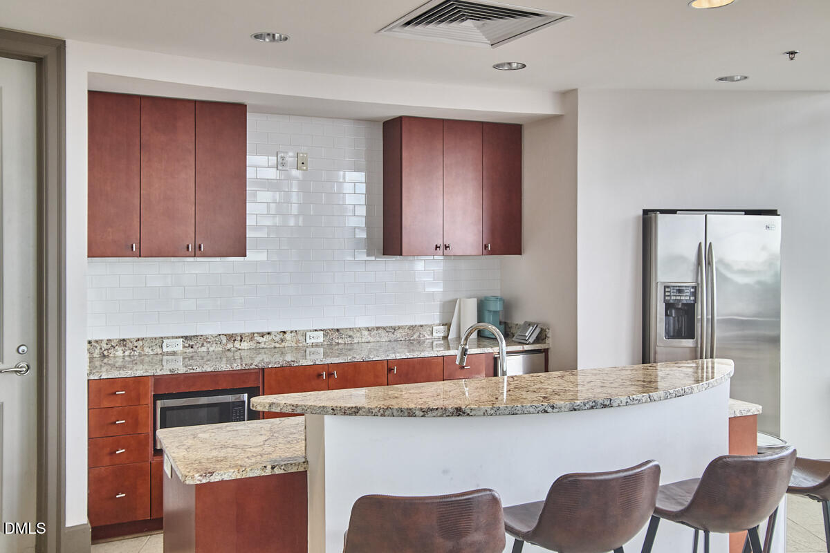 301 Fayetteville Street, Unit 2304 Raleigh, NC 27601 - Photo 32 of 47 Club Kitchen