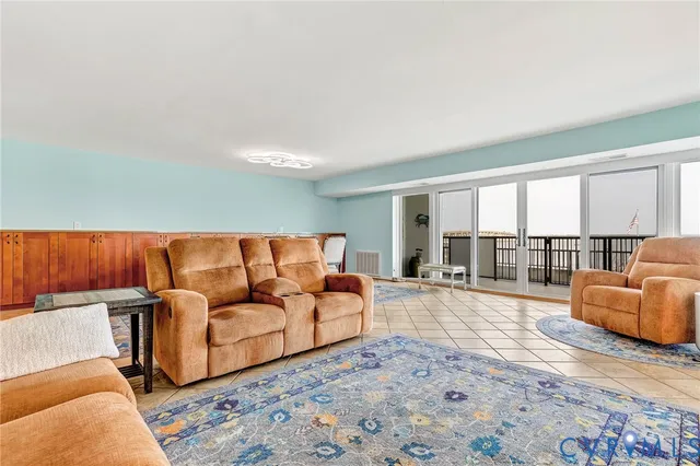 a bathroom with a sink a toilet a mirror and shower