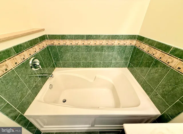 a view of a swimming pool with a balcony