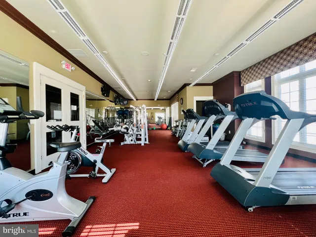 a dining room with lots of tables and chairs
