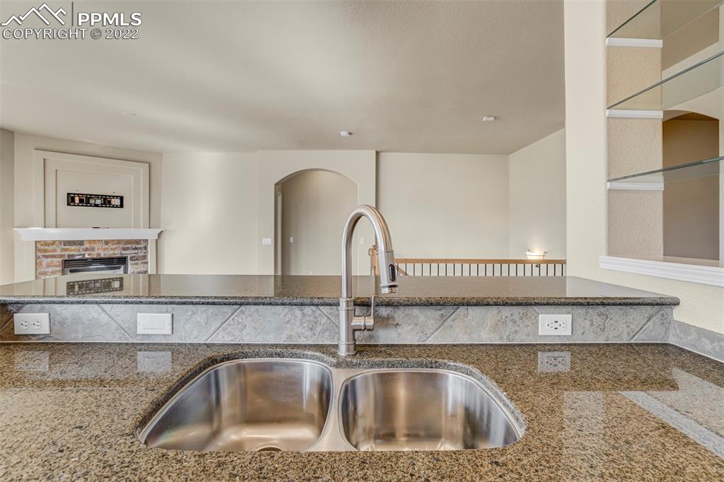 2664 Cinnabar Road Colorado Springs, CO 80921 - Photo 21 of 50 a close view of a sink and a counter top space in the bathroom