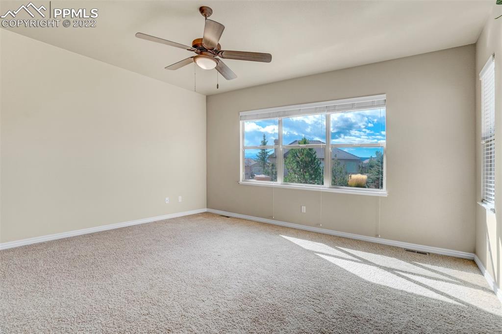 2664 Cinnabar Road Colorado Springs, CO 80921 - Photo 24 of 50 a view of an empty room with a window