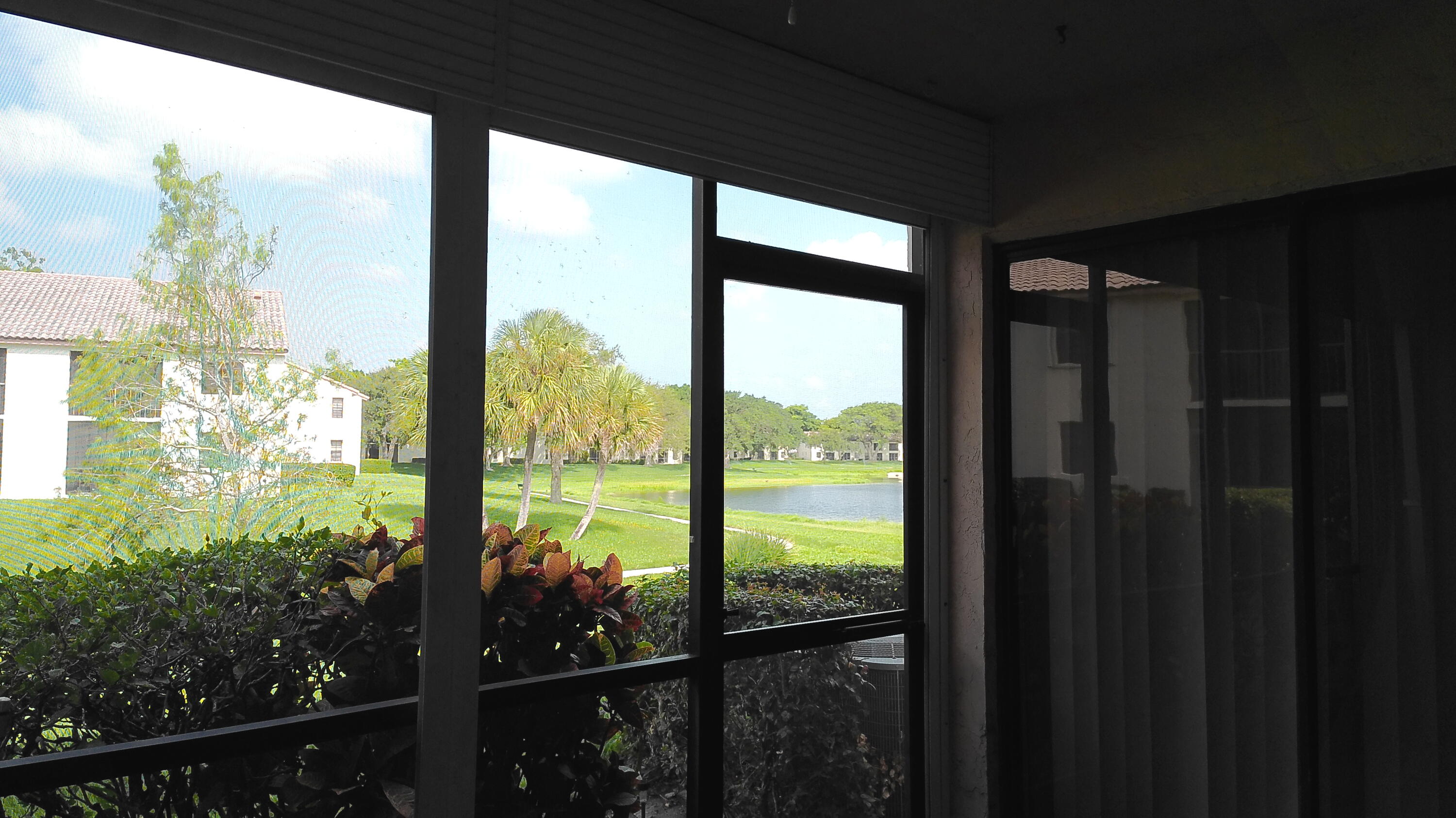 3180 Leewood Terrace, Unit L108 Boca Raton, FL 33431 - Photo 20 of 23 Screened Patio