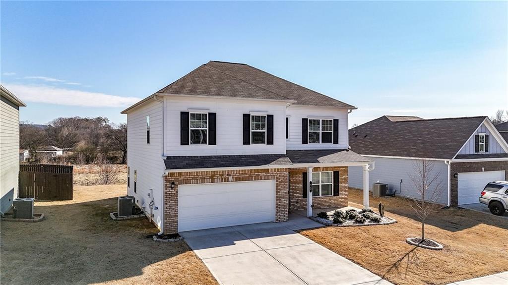 25 Thacker Trail Adairsville, GA 30103 - Photo 40 of 47 a front view of a house with a yard