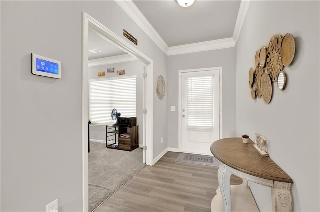 25 Thacker Trail Adairsville, GA 30103 - Photo 6 of 47 a view of a livingroom with furniture and a mirror