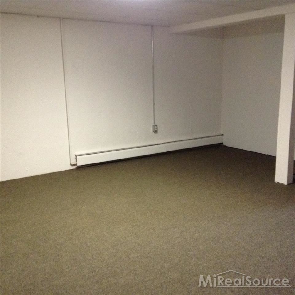 1135 Tienken Court, Unit 17 Rochester, MI 48306 - Photo 22 of 25 Spacious Finished Basemen