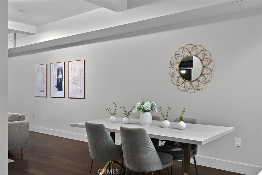 433 Pine Avenue, Unit 102 Long Beach, CA 90802 - Photo 11 of 60 a view of a dining room with furniture