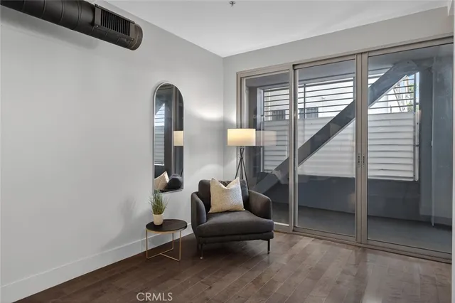 a kitchen with stainless steel appliances kitchen island granite countertop a sink and cabinets