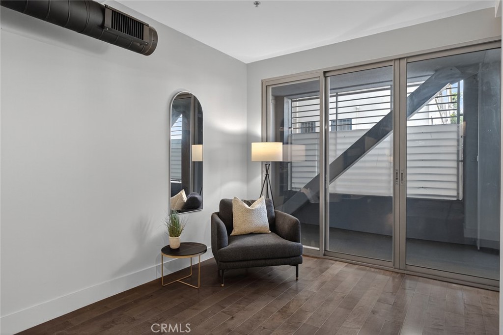 433 Pine Avenue, Unit 102 Long Beach, CA 90802 - Photo 14 of 60 a living room with furniture and a window