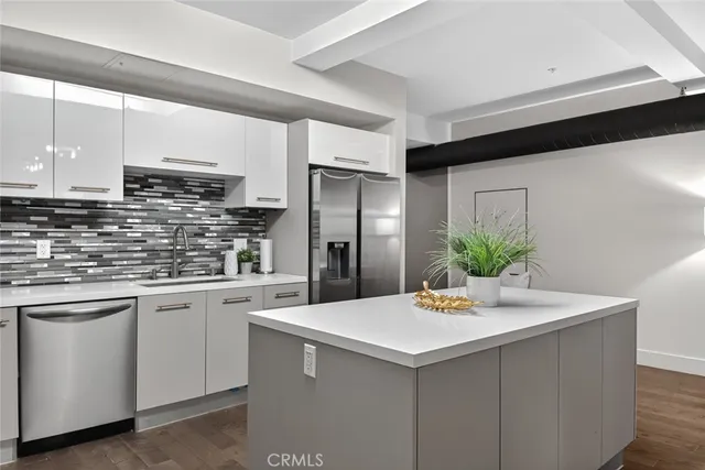 a kitchen with a stove and a microwave