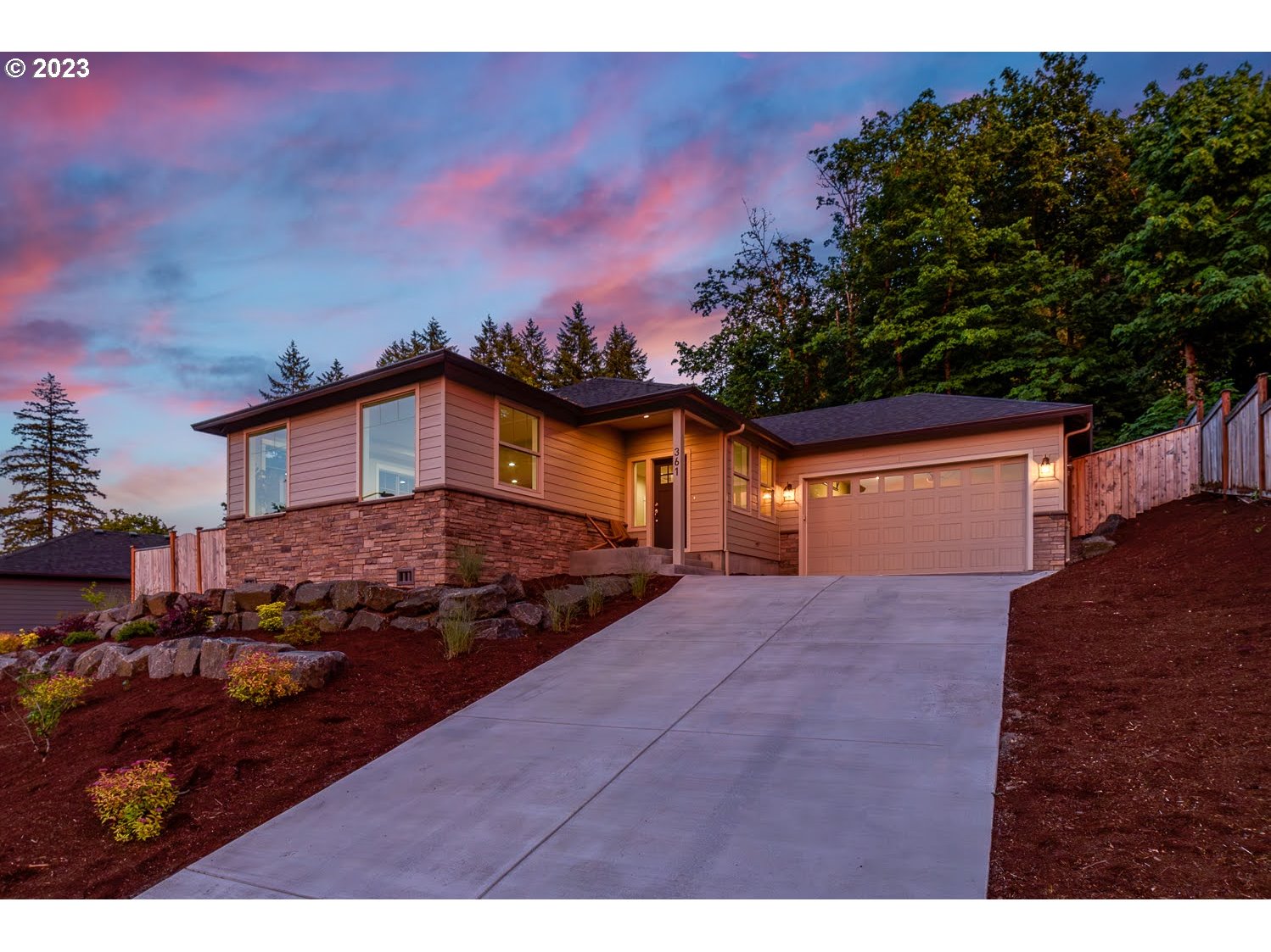 361 Mountaingate Drive Springfield, OR 97478 - Photo 1 of 35 a front view of a house with a yard