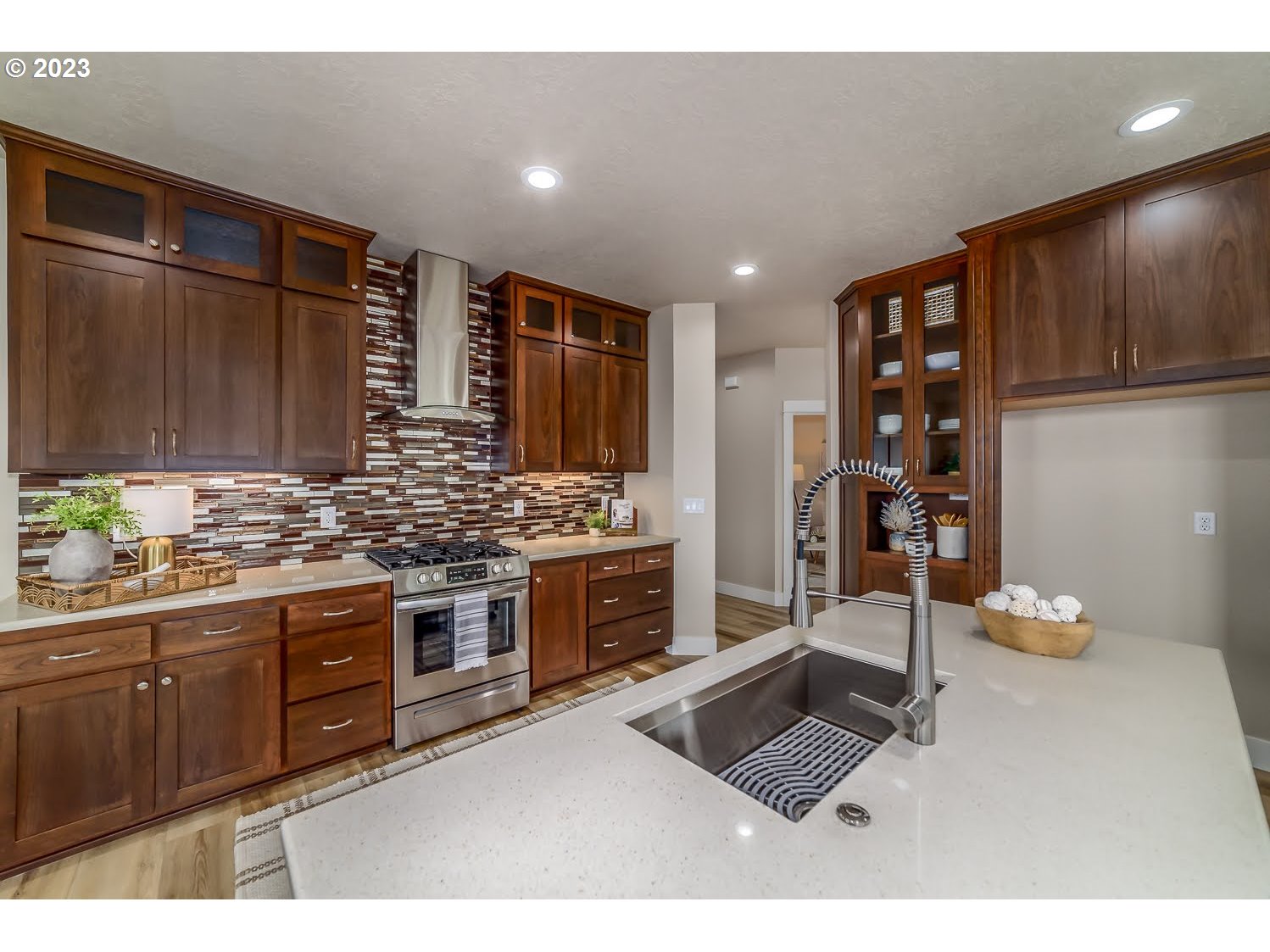 361 Mountaingate Drive Springfield, OR 97478 - Photo 13 of 35 a kitchen with stainless steel appliances granite countertop a stove a sink and a refrigerator