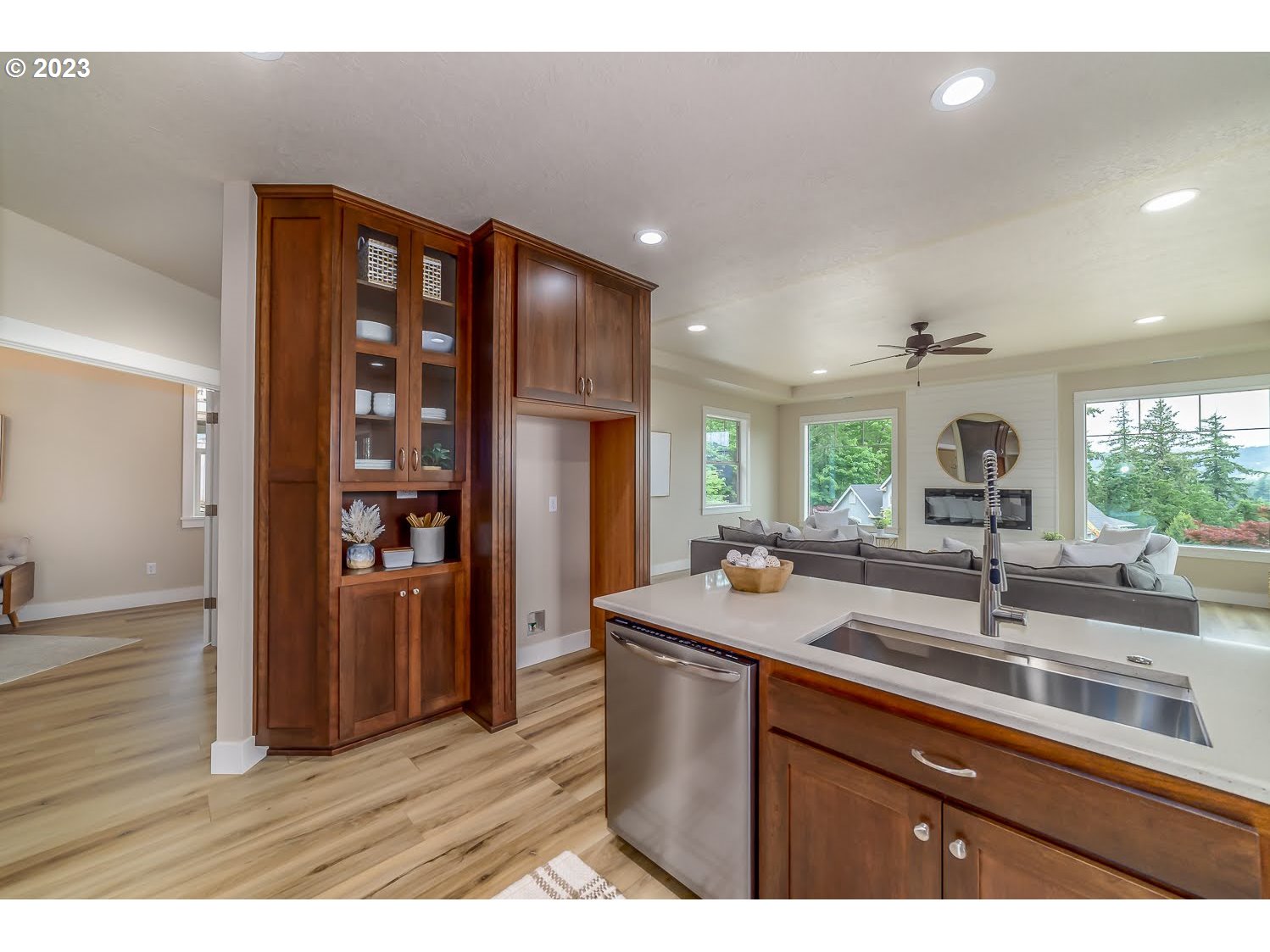 361 Mountaingate Drive Springfield, OR 97478 - Photo 14 of 35 a kitchen with stainless steel appliances granite countertop a sink and wooden cabinets